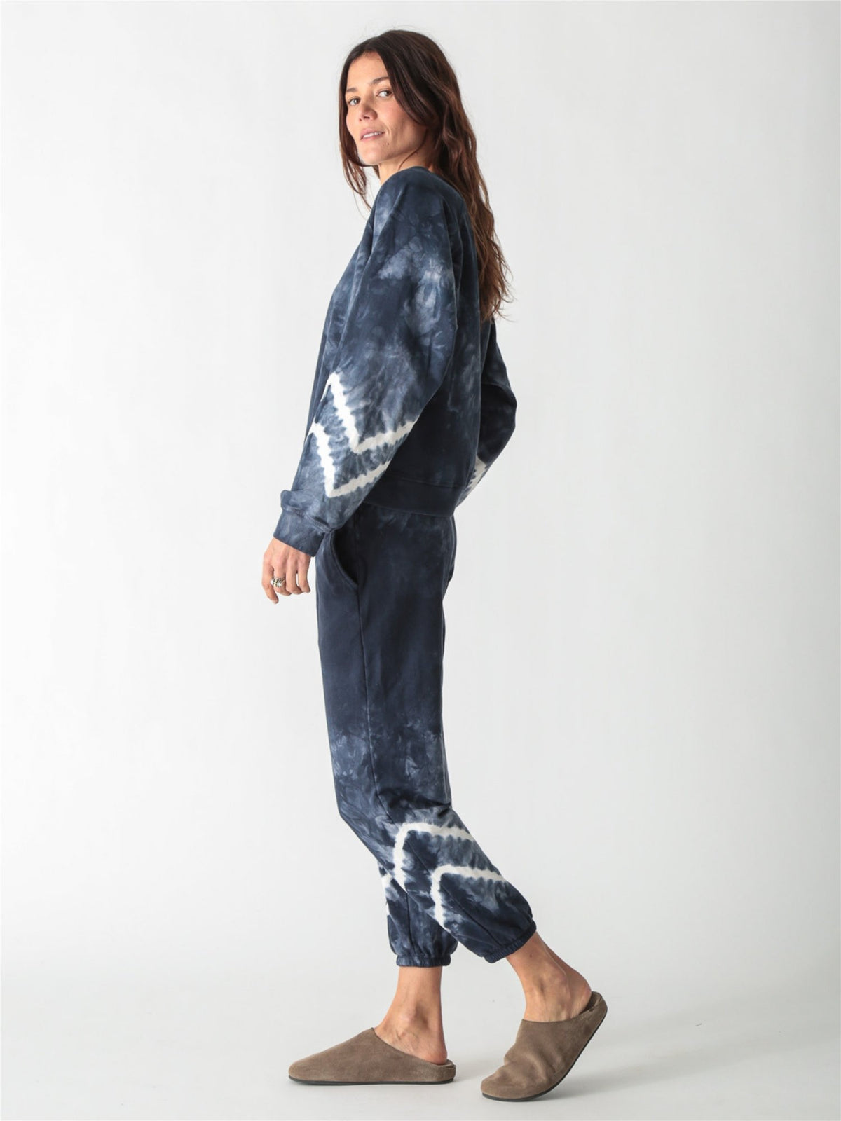 Navy blue tie-dye crewneck sweatshirt with long sleeves featuring white contrast tie-dye bands.