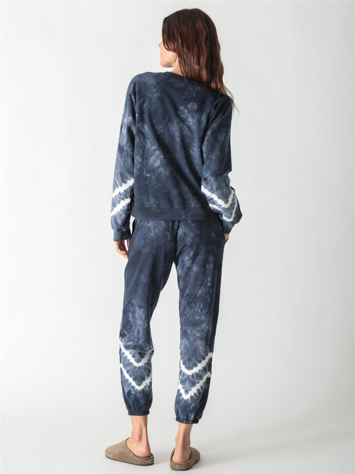 Navy blue tie-dye crewneck sweatshirt with long sleeves featuring white contrast tie-dye bands.