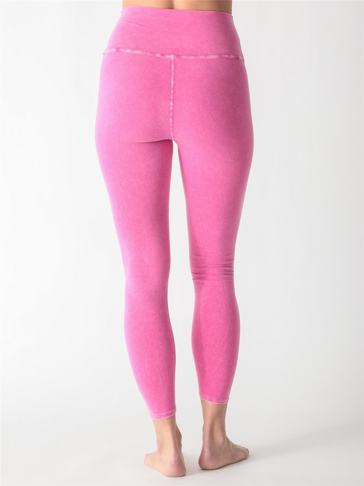 Mineral-washed hot pink high-waisted performance leggings.