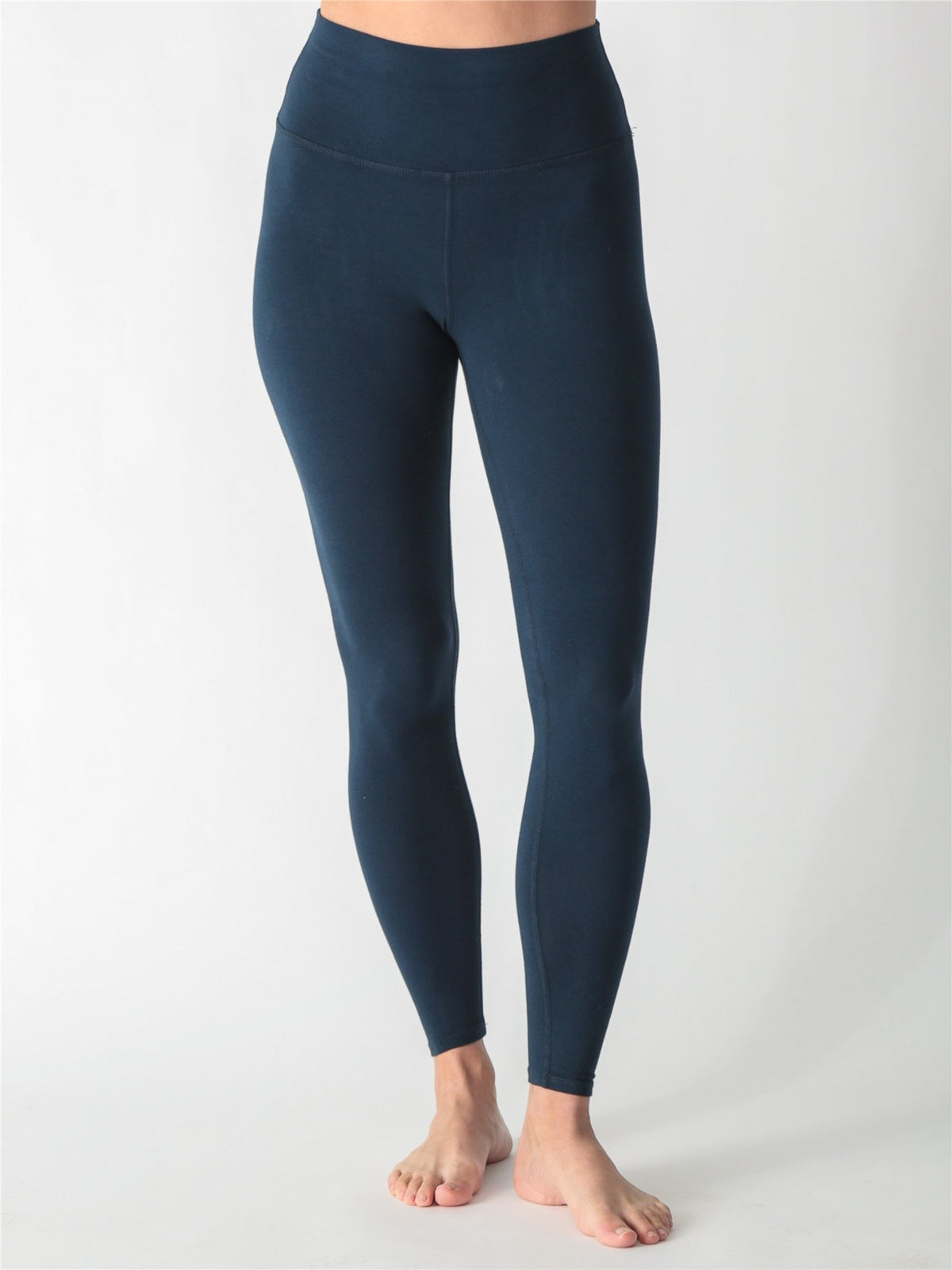 Dark navy blue high-waisted performance leggings.