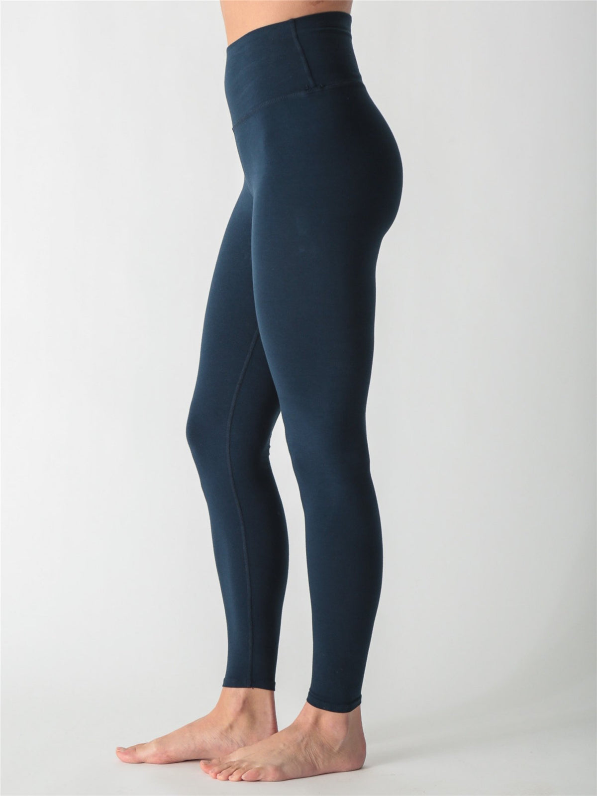 Dark navy blue high-waisted performance leggings.