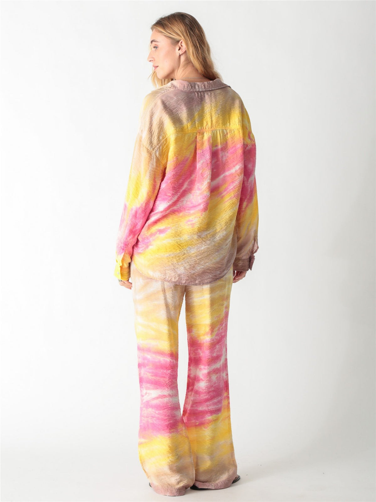 A pink and yellow tie-dye long-sleeve button-down shirt with a classic collar and single chest pocket.