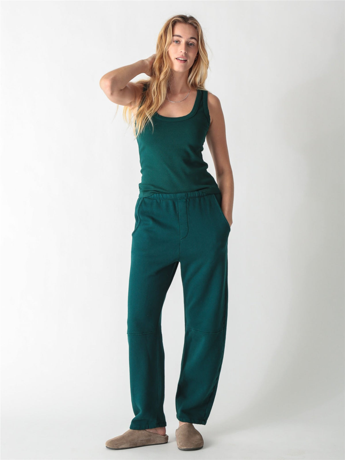 Pine green ribbed tank top with a scoop neckline and thick straps.
