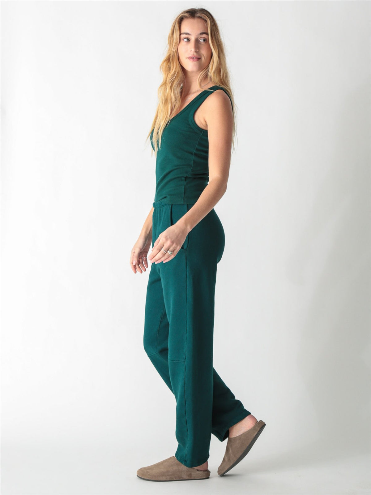 Pine green ribbed tank top with a scoop neckline and thick straps.
